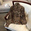 Luxury leopard print blouse with tie-waist, stand collar, and lantern sleeves - elegant workwear for women, 1688 source