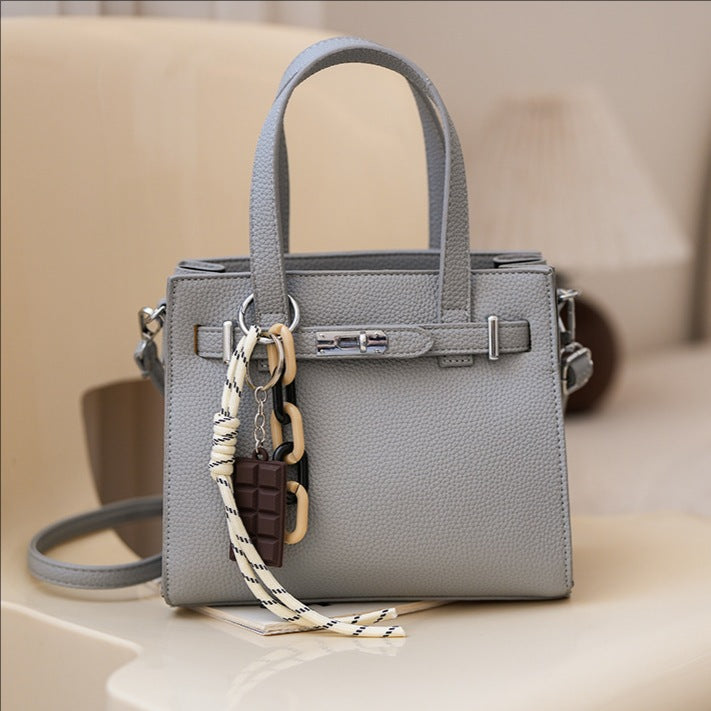 Cross-border niche soft leather portable Kelly bag women's bag 2025 new simple shoulder bag lychee pattern commuter messenger bag