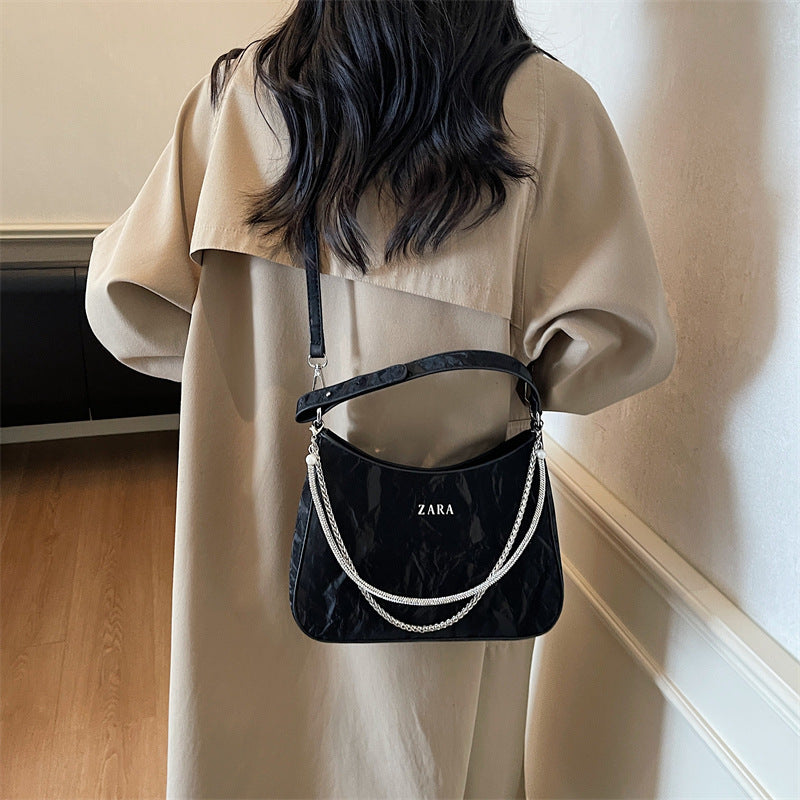 High-end women's bag, large capacity, 2025 new style, niche design, shoulder bag, crossbody bag, understated luxury, textured, commuter tote bag