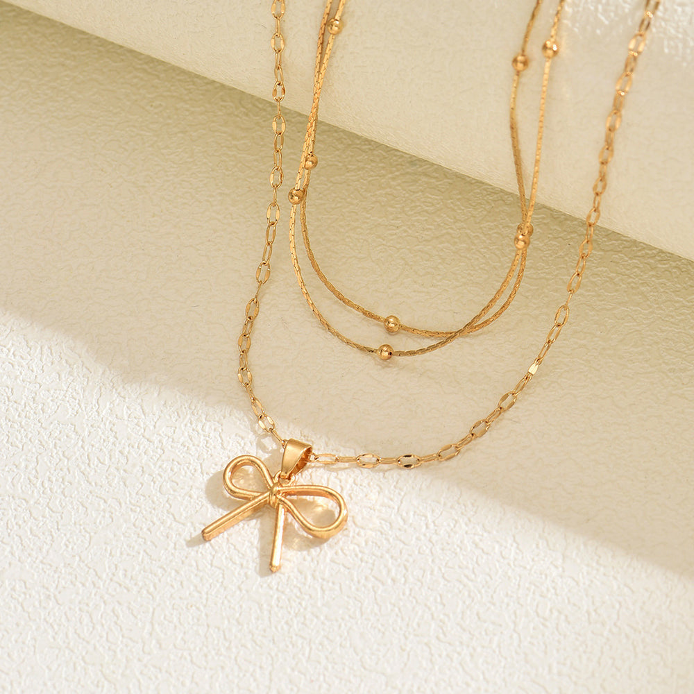 European and american cross-border fashion minimalist alloy bow pendant necklace, light luxury small multi-layered beaded chain necklace