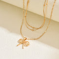 European and american cross-border fashion minimalist alloy bow pendant necklace, light luxury small multi-layered beaded chain necklace