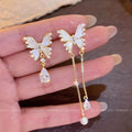 Sense of design butterfly tassel earrings for women classy sense of accessible luxury cool sense of earrings 2025new arrival asymmetrical earrings