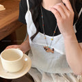 Cute puppy pendant necklace, perfect for summer. a colorful dopamine necklace, long enough to wear with hoodies or as a skirt accessory
