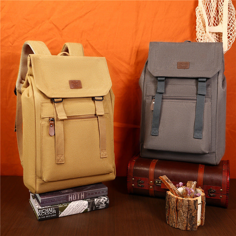 New canvas backpack men's outdoor travel leisure sports personality fashion flip backpack Chinese college student schoolbag