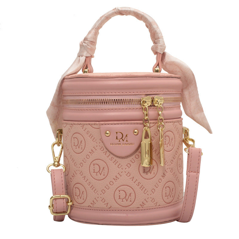 Solid color texture small bag women's autumn 2025 new trendy fashion niche portable round bucket bag popular messenger bag