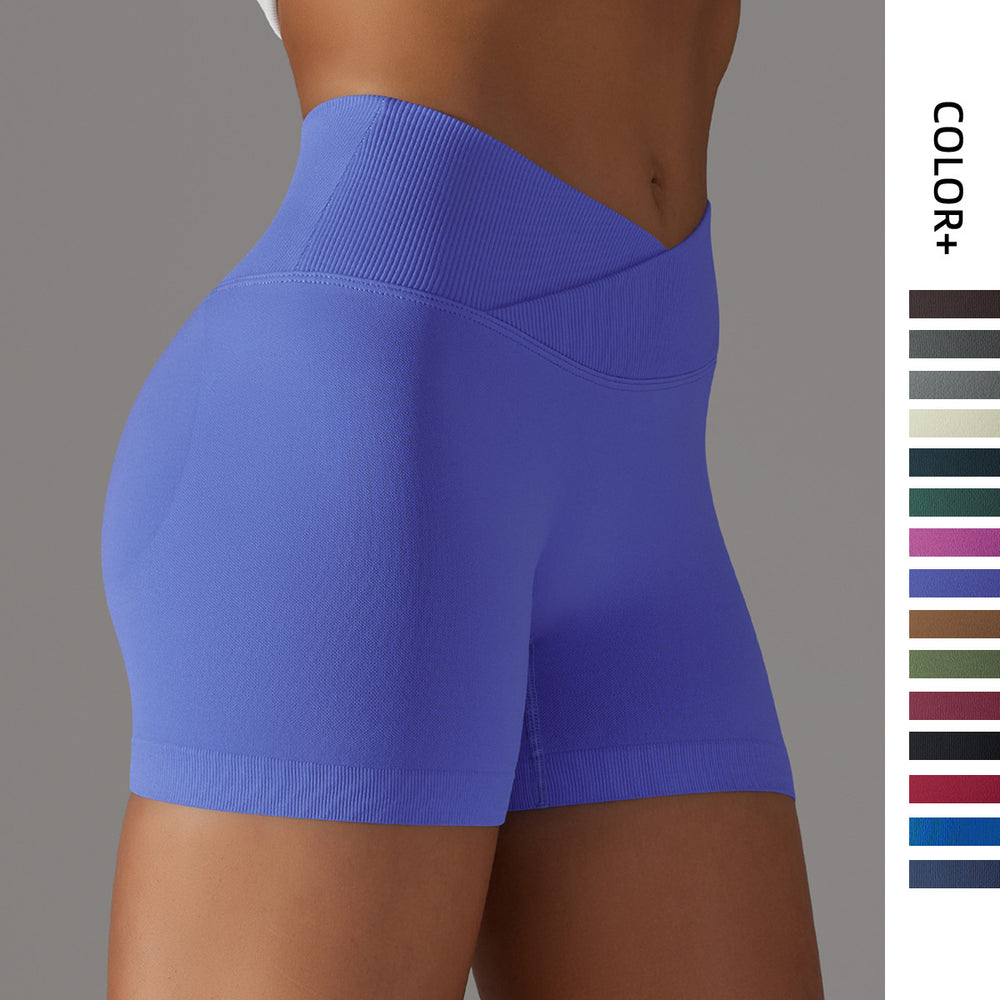 fashion seamless knitting breathable pure color cross waist peach butt yoga shorts running fitness three-quarter pants women