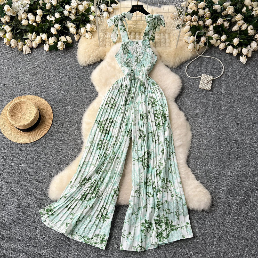Women's summer jumpsuit for travel & vacation: stretchy, ruched, cinched waist, floral print, spaghetti strap, wide leg, long pants, beachwear