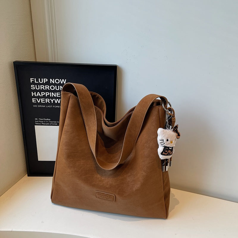 Large capacity retro handbag for women, trendy 2025 new arrival, minimalist versatile soft shoulder bag, high-end commuter tote bag