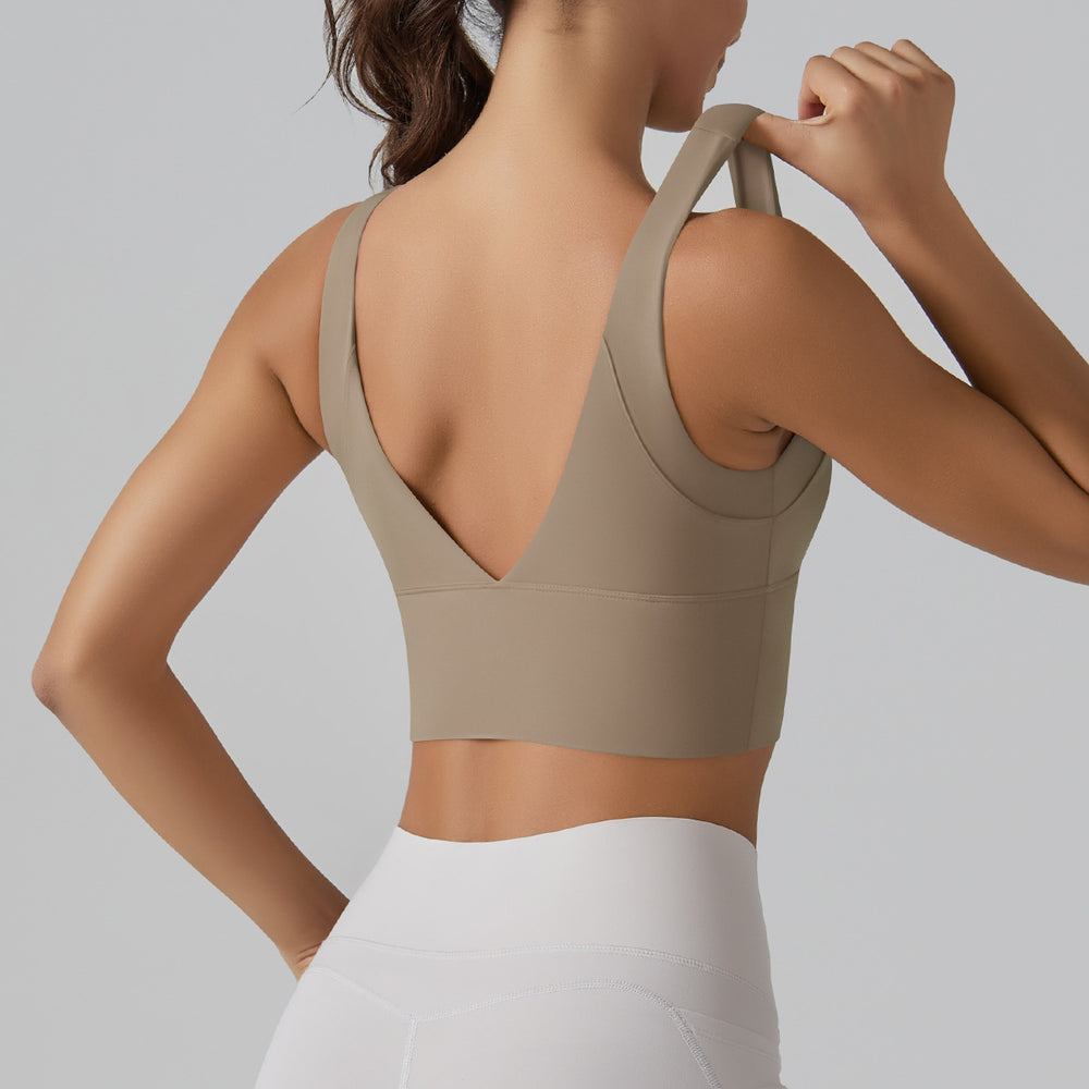 New arrivalnude yoga sports brasexy deep v beautiful back fixed all-in-one cup sports intimates fitness vest women