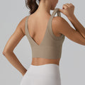 New arrivalnude yoga sports brasexy deep v beautiful back fixed all-in-one cup sports intimates fitness vest women