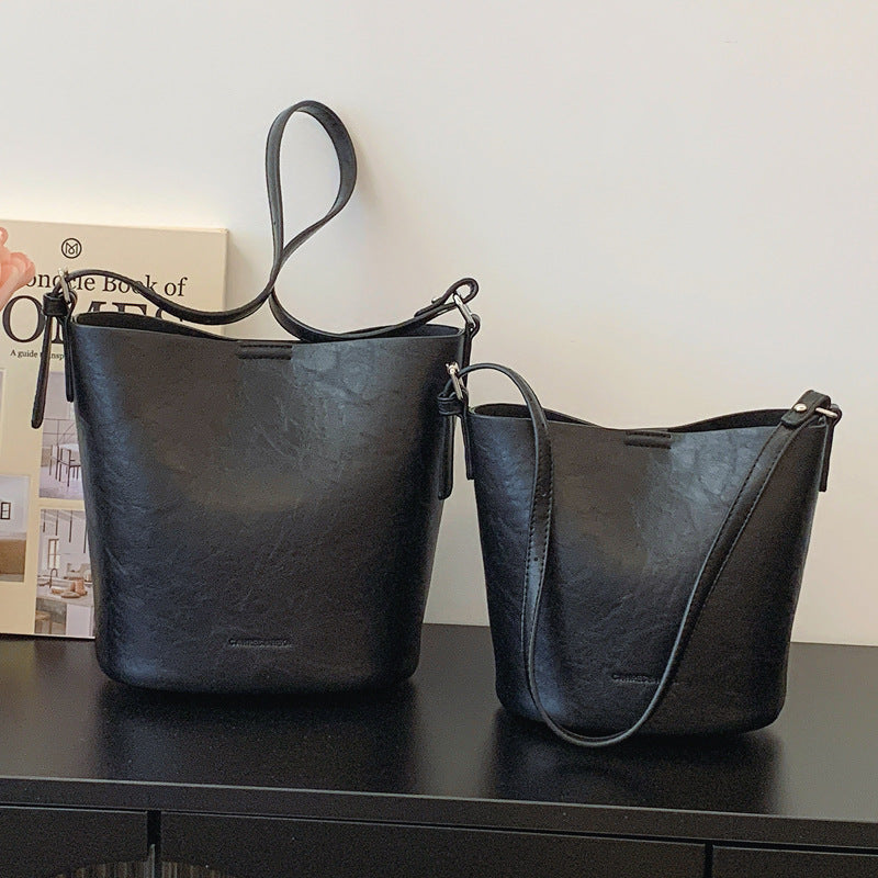 Retro niche design bag women's 2024 new simple messenger bag high-end fashion shoulder bucket bag