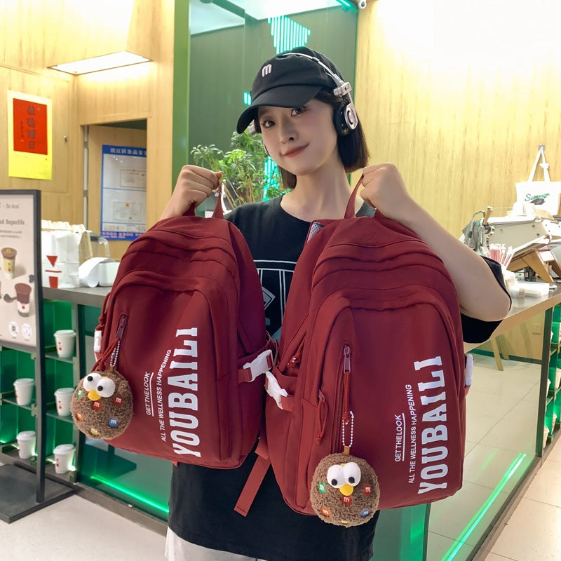 School bag for girls, junior high school students, middle school students, large capacity, versatile burden reduction, fashion trend, high school college students, backpack