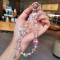 Classy heavy industry diamond-encrusted butterfly pendant colorful round beads ins style crystal beaded bag wrist style mobile phone chain