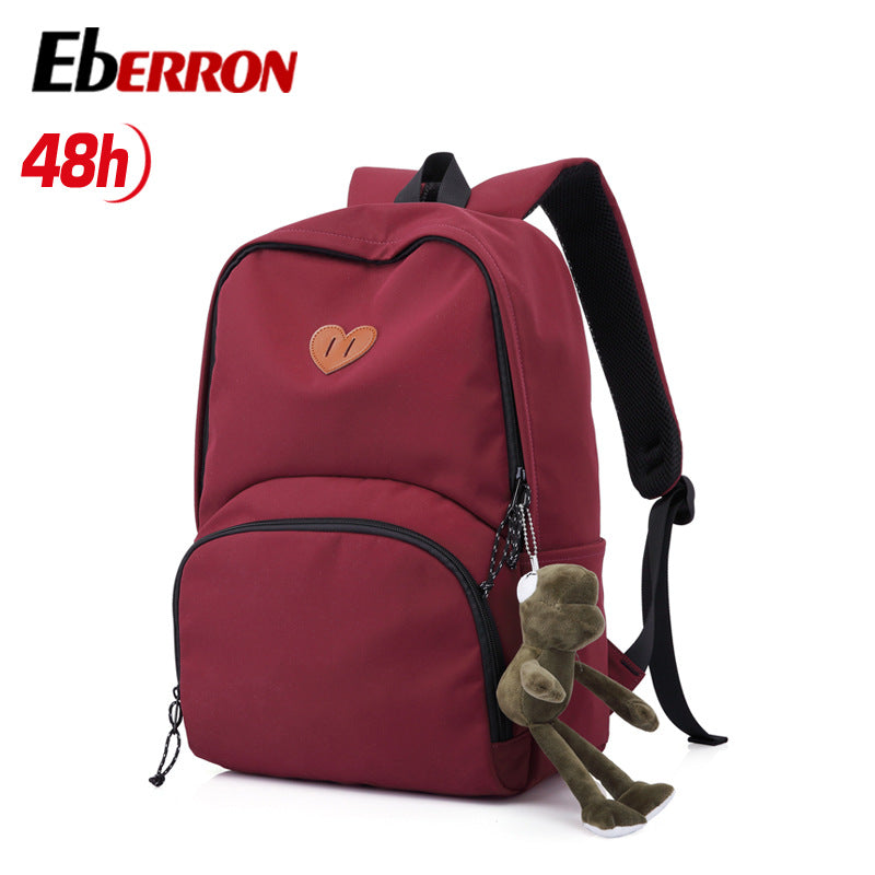 New simple and versatile schoolbag, high-value dirt-resistant belt, doll large-capacity backpack, male and female middle school student backpack.
