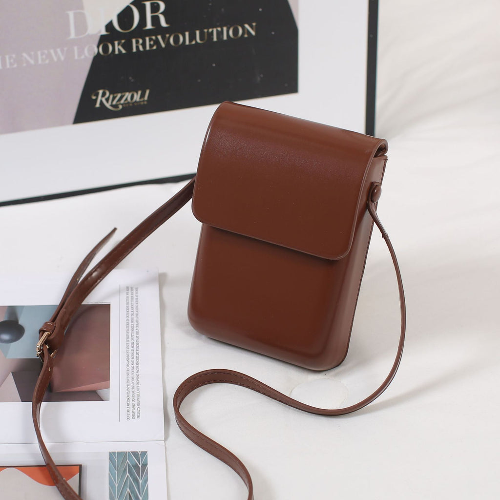 Cross-border diagonal span vertical mobile phone bag, simple and fashionable pressure shell bag, niche solid color change bag, retro texture messenger bag.