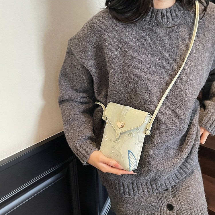 Cross-border embroidered canvas bag women's summer 2025 new fashion niche messenger bag Korean version Internet celebrity popular mobile phone bag