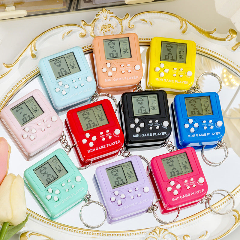 Pocket tetris game console - creative mini electronic game console keychain - nostalgic stress relief toy