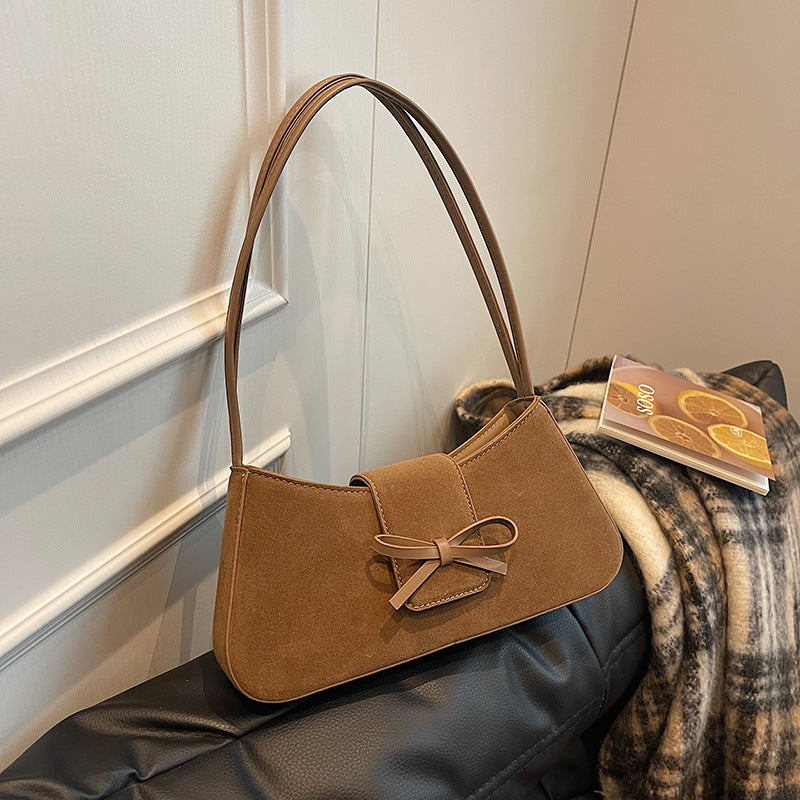 Red bag women's bag 2025 new shoulder baguette bag Korean version fashion minimalist niche bow armpit bag