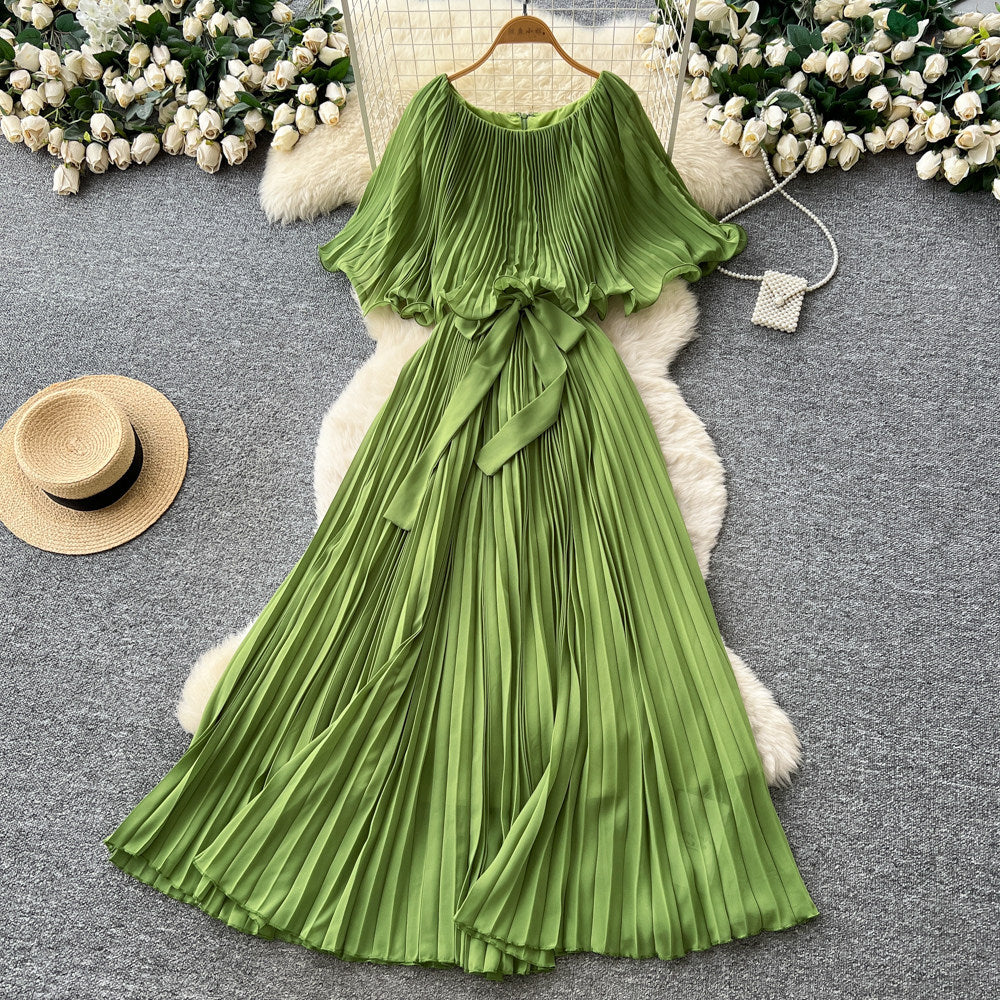 French-inspired pleated dress for women, featuring a bow tie, off-the-shoulder design, tie-waist, and flattering pleats for an elegant and sophisticated look