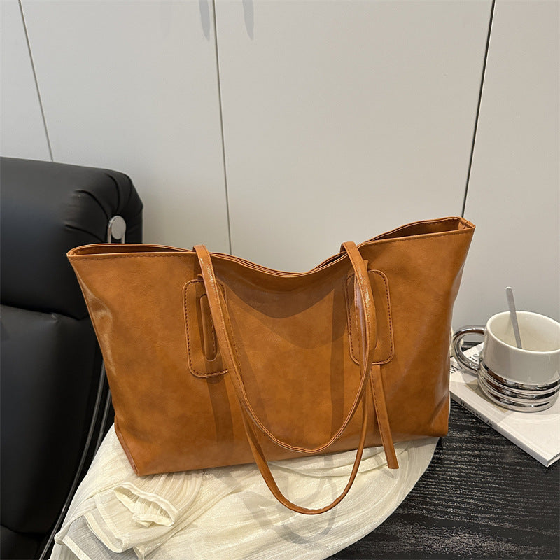 Retro fashion large capacity 2025 casual solid color new commuter retro soft surface tote underarm shoulder bag