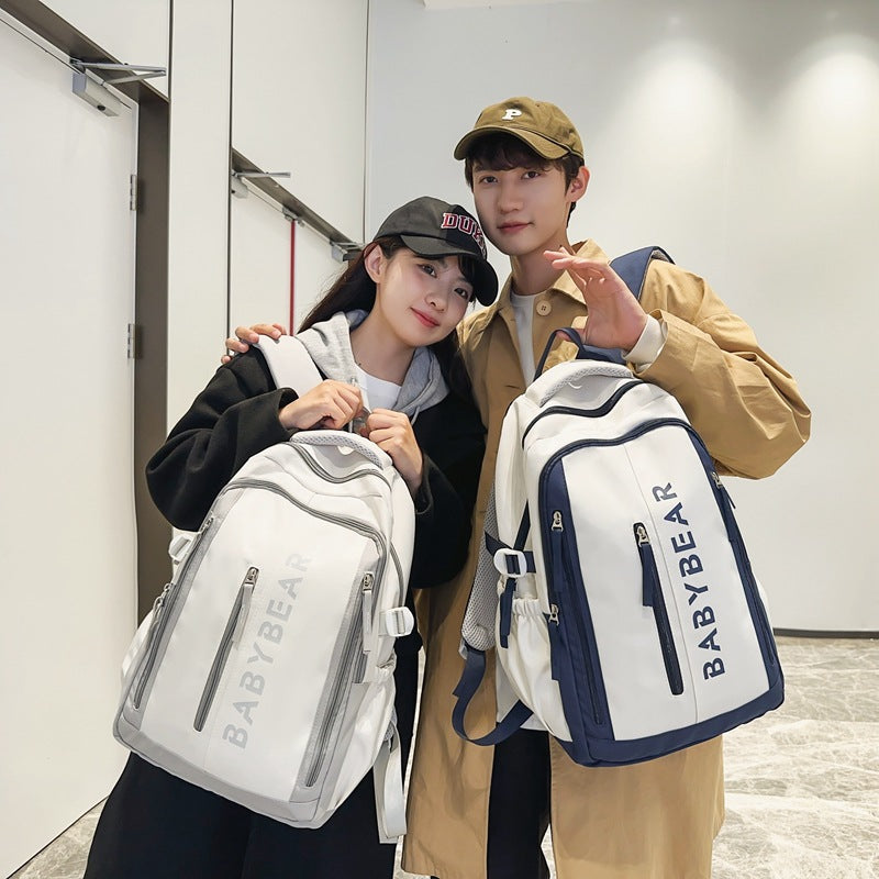 School bag for female college students, Korean version for junior high school students, high school, large-capacity burden reduction backpack for men's middle school students, casual backpack.
