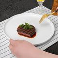Modern minimalist ceramic steak plate for western cuisine, restaurant, and hotel use - white round porcelain plate, pure white home-use cold dish plate, dinner plate
