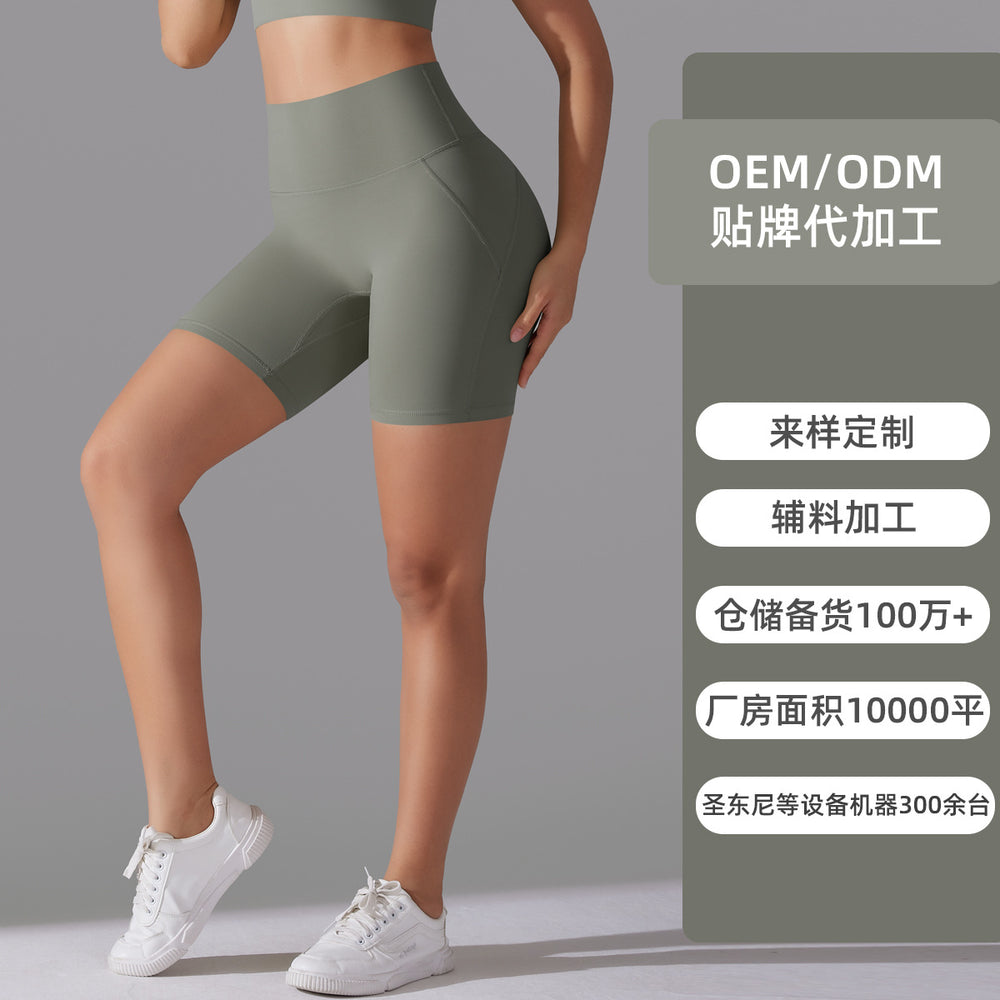 Naked-feel, high-waisted, butt-lifting yoga shorts – perfect for running, fitness, and a custom-made, three-quarter length fit. sampling and oem manufacturing available