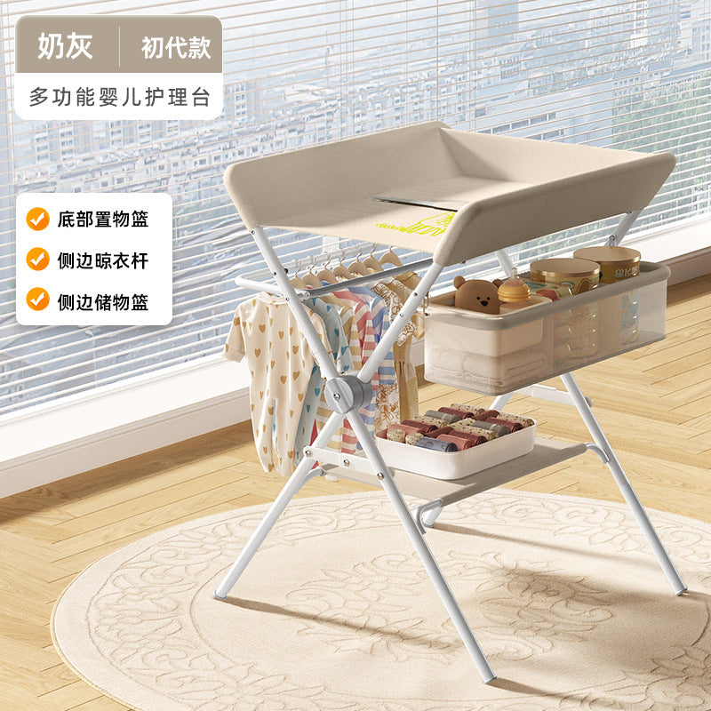 Baby changing table - newborn diaper changing, bathing, massage, and bed - foldable multifunctional baby bed
