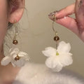 Vacation style white flower earrings for women niche stylesense of designstylish exaggerated earrings for big round face modification earrings trendy