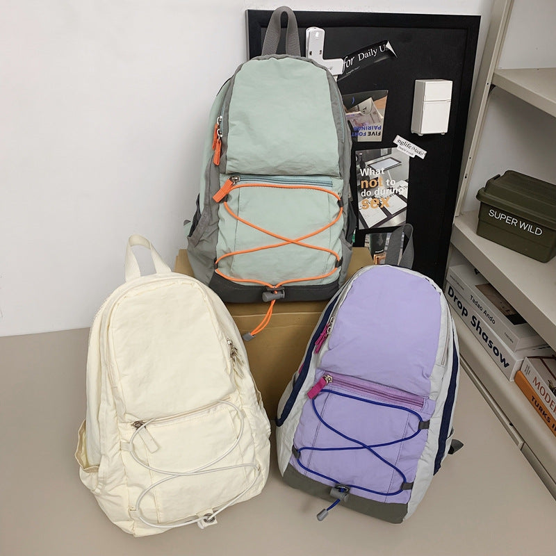 Outdoor casual backpack 2025 new cross strap niche high value backpack couple going out travel bag tide