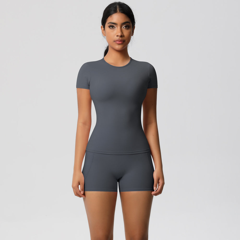 European and american style fleece-lined quick-dry short-sleeve yoga set with pocketed shorts for outdoor running and fitness