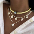 Bohemian seaside necklace wholesale european and american cross-border beach style necklace women's fishtail shell love pendant