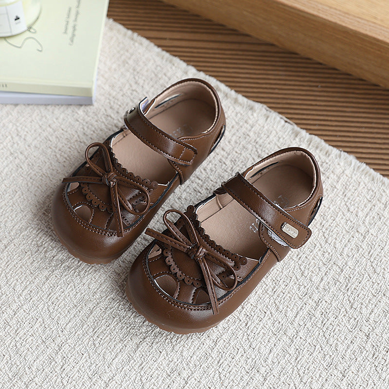 New girls' sandals: summer kids' fashion bow solid color princess shoes, soft sole hollow-out classic leather shoes