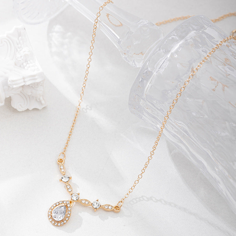 Water drop necklace wholesale european and american cross-border jewelry personalized diamond-encrusted niche high-end versatile autumn and winter sweater pendant for women