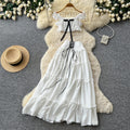 French sweet style off-the-shoulder puff sleeve top with tie-waist high-waisted tiered skirt slimming two-piece set - new summer collection for women