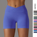 fashion seamless knitting breathable pure color cross waist peach butt yoga shorts running fitness three-quarter pants women