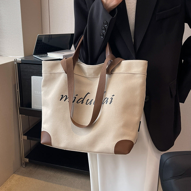 Canvas bag women's large-capacity 2023 new summer versatile simple shoulder bag cloth bag class commuter tote bag