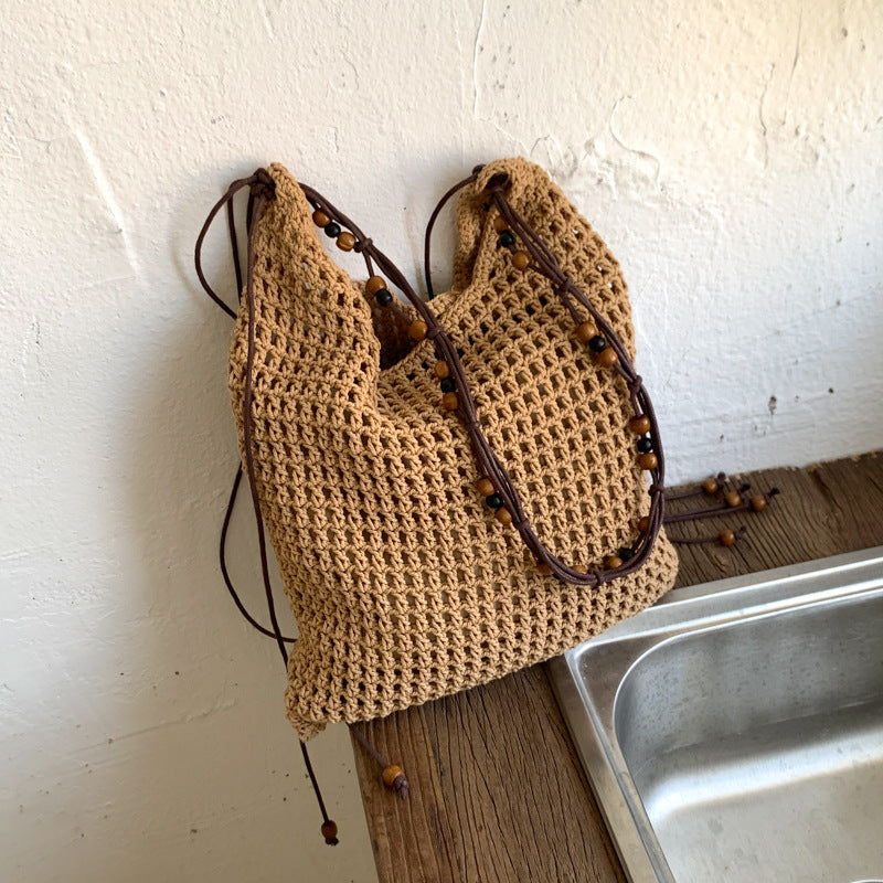 Cross-border niche design mesh bag hollow woven tote bag shoulder messenger bag 2025 new leisure style beach bag