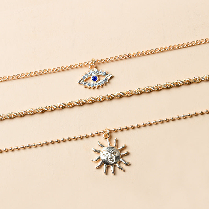 Wholesale devil's eye necklace - cross-border alloy jewelry, unique sun pendant, women's multi-layer necklace, trendy ins style accessories