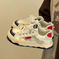 Cute white shoes chinese fashion cat ugly cute big toe shoes women 2026 winter thick sole student sports casual shoes color matching