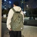 Trendy and cool backpack for college students, stylish casual backpack with letter design, large capacity, suitable for elementary, middle, and high school students, unisex