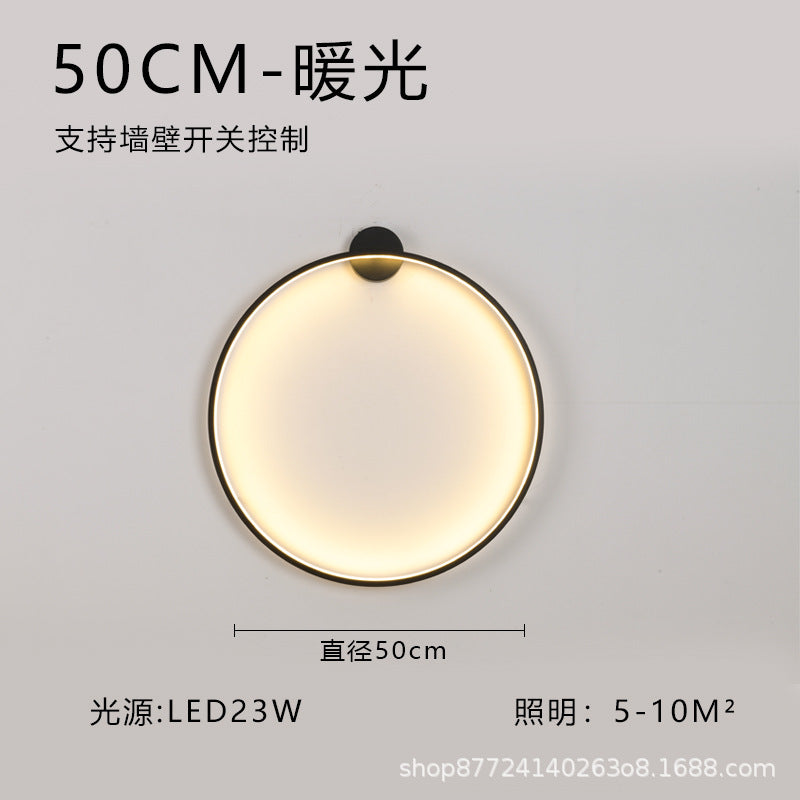 Minimalist chic large round wall sconce - stylish ambient lighting for living room backdrops, bedroom headboards, and more