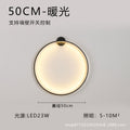 Minimalist chic large round wall sconce - stylish ambient lighting for living room backdrops, bedroom headboards, and more
