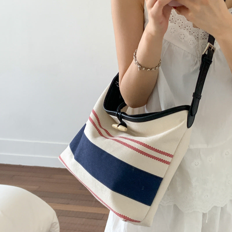 Cross-border striped canvas bag women's large capacity 2025 new summer versatile shoulder messenger bag college student tote bag
