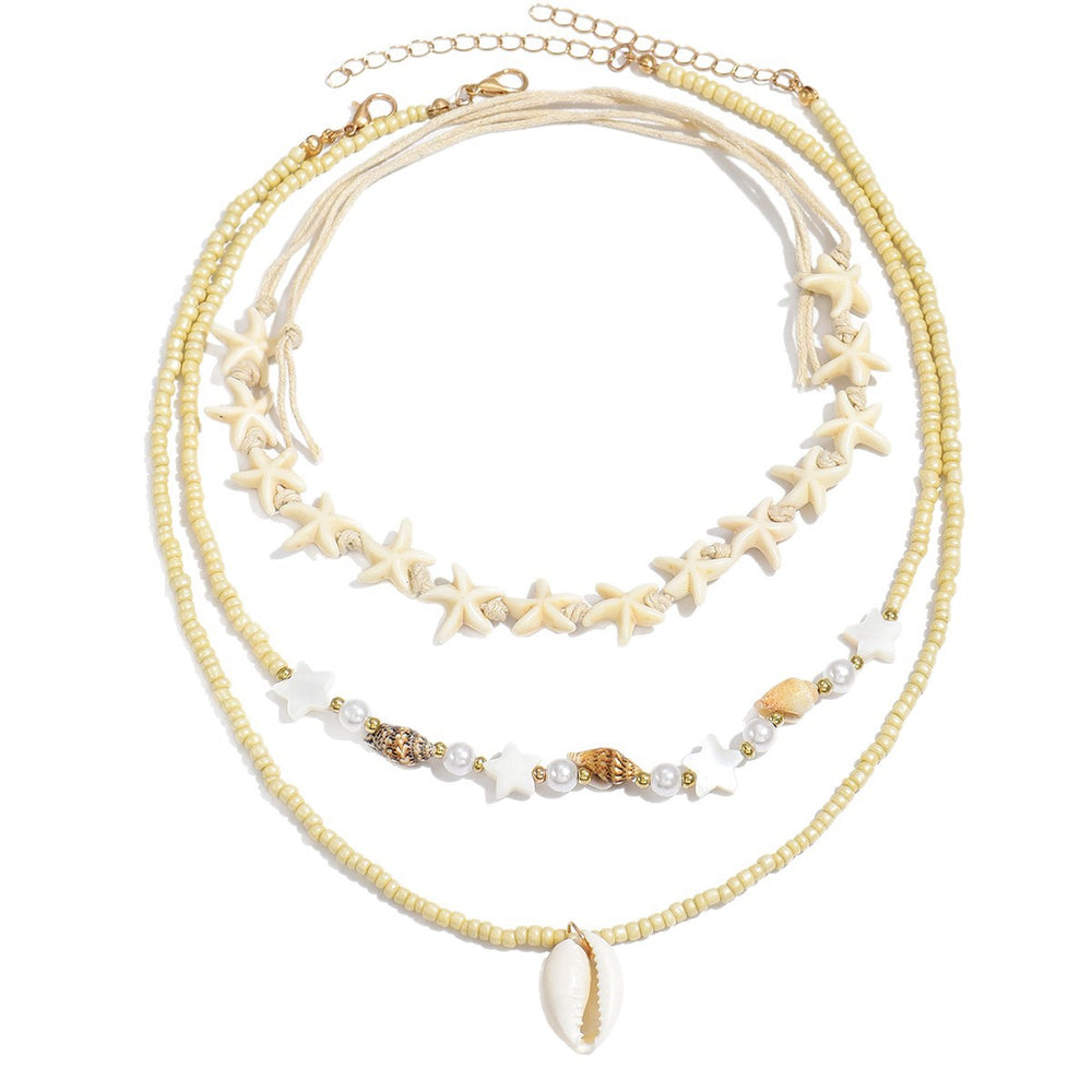 Wholesale autumn/winter sweater necklaces: european & american cross-border style - ocean-inspired starfish & seashell jewelry, subtly luxurious, niche design, stackable pearl chokers