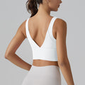 New arrivalnude yoga sports brasexy deep v beautiful back fixed all-in-one cup sports intimates fitness vest women