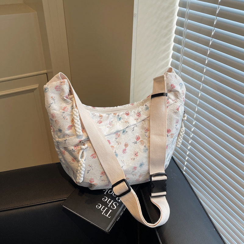 Foreign order niche floral dumpling bag women's 2025 new versatile shoulder bag versatile large-capacity casual messenger bag