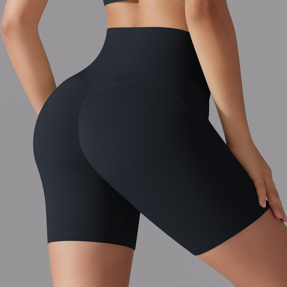 Naked-feel, high-waisted, butt-lifting yoga shorts – perfect for running, fitness, and a custom-made, three-quarter length fit. sampling and oem manufacturing available