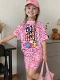 Girls' t-shirt and shorts set featuring a cartoon short-sleeve design and printed graphics, perfect for a cute and casual streetwear look