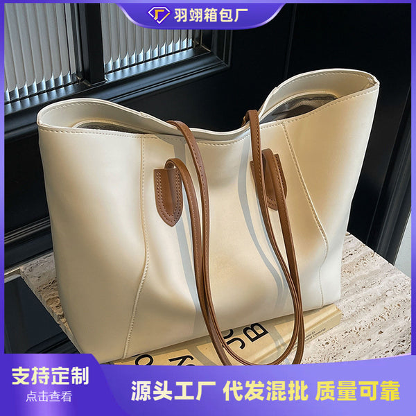 Tote bag women's 2024 new large-capacity commuter bag summer high-end versatile shoulder bag simple class bag